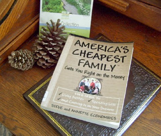 America's Cheapest Family Gets You Right on the Money Book Cover sitting on a table with two pinecones.