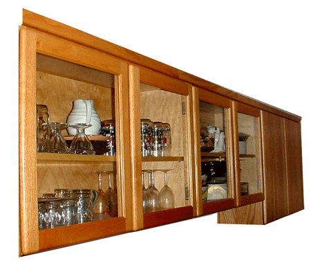 A row of glass doored kitchen cabinets.