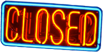 Neon sign that says "Closed" in red letters.