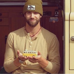 DANIEL NORRIS a major league baseball player with a beige shirt and a knit cap.