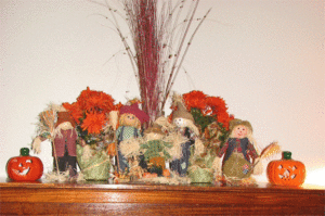 Fall piano decor close up photos of straw dolls and pumpkins