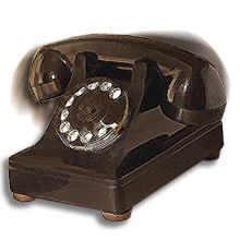 An antique black rotary phone.