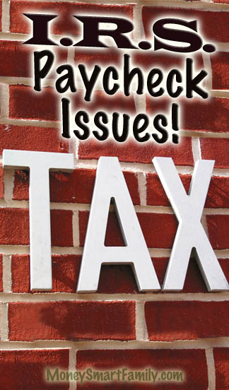Paycheck Mistake? A red brick will with large white letters spelling out "Tax."