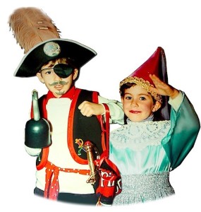 Two children dressed up for Halloween. Boy as a Pirate and girl as a Princess.