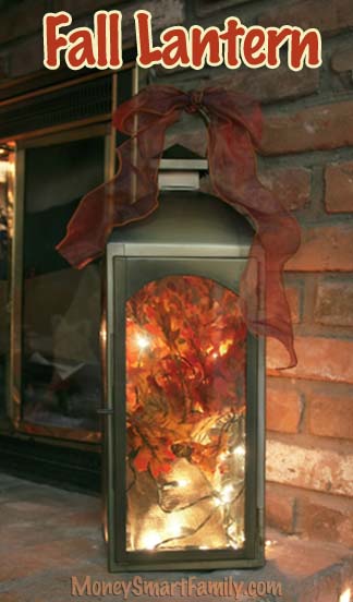 A DIY Autumn/ Thanksgiving/ Fall Lantern Decoration w/ Silk Leaves & White Twinkle Lights.