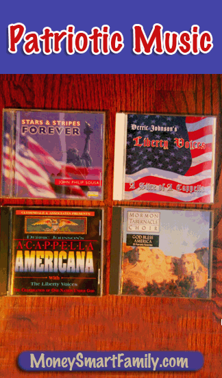 Four patriotic music cds laying on an oak floor.