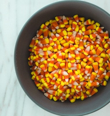 Candy corn guessing game for halloween.