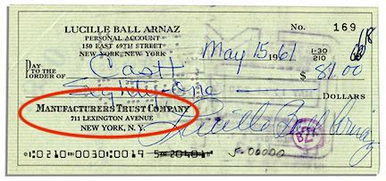 Sample check with issuing bank name circled in red.