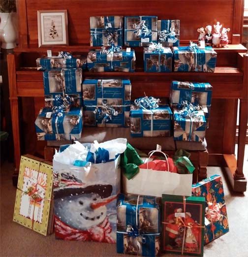 Fun Family Tradition Examples: For the Holidays and The Whole Year 14 Wrapped Christmas presents wrapped by our piano.