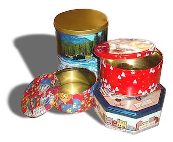 Colorful holiday tins used for wrapping presents.