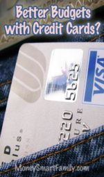 A silver and blue visa card in a blue jean pocket