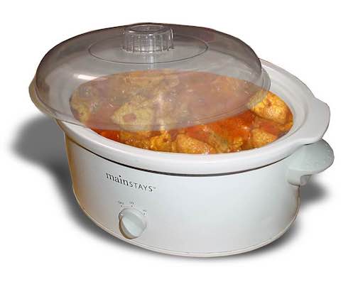 Use a Crockpot for a Year and Save $3400! 3 A white crockpot full of chicken marsalla.