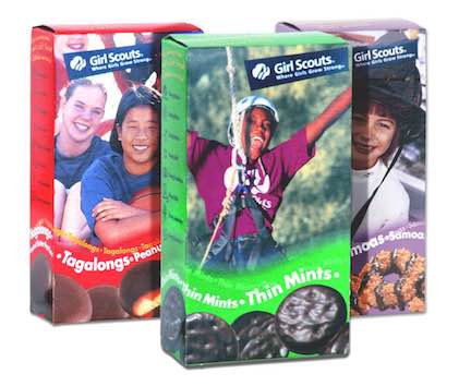 3 boxes of girl scout cookies.