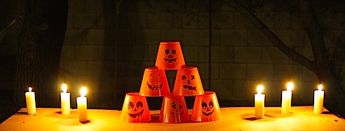 DIY Halloween Party Games, Crafts & Food Ideas for Fun Harvest Festival 2 Candles and Halloween cups for a DIY squirt gun game.