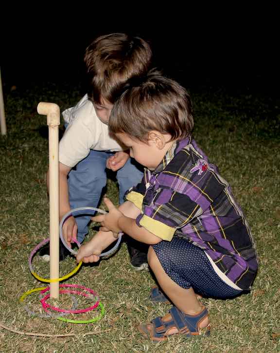 DIY Halloween Party Games, Crafts & Food Ideas for Fun Harvest Festival 7 Cousins Jason and Stark play the ring game with glow stick loops.