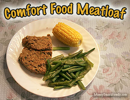 Ground Beef Main Dish Recipe Collection 4 A white plate with green beans, half ear of corn and 2 slices of meatloaf.