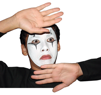 10 DIY Non-Scary Halloween Costumes that are Easy, Cheap & Fast 6 A boy with his face painted white, dressed up as a mime for halloween.