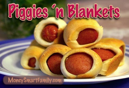 Pork Main Dish Recipes (Ham and Sausage too) – Delicious to Eat! 11 Piggies in blankets stacked on a white plate with blue trim.