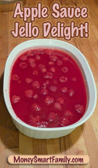 Raspberry Apple Sauce Jello dessert in a white ceramic bowl.