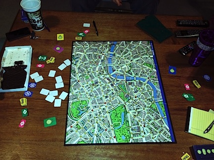 Family Game Night Ideas: 46 Activities and Games That Are Fun & Cheap 13 Scotland Yard board game on a wooden table.