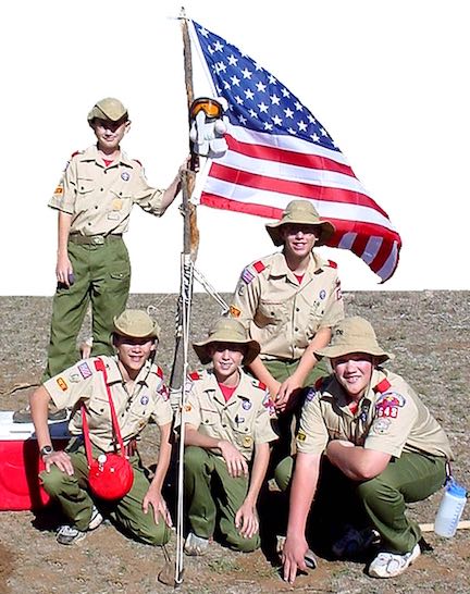 Boy Scouts holding an American Flag.
