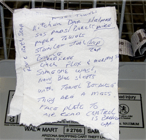 15 Ways to Wreck Your Food Budget 2 A crumpled shopping list written on a napkin.