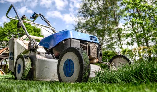 Summer Jobs for Teens: Finding Work & Earning Money 7 Lawn mower on green grass - a great summer job for teens.
