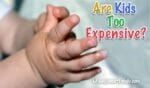 Are Kids Too Expenisve? Two baby hands counting fingers.