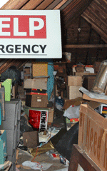 An attic full of disorganized stuff.