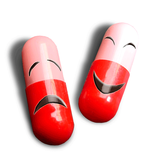 Two large red and pink pills, one with a smiling face and the other with a frown.