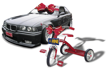 A red tricycle and a black bmw both with red bows on them.