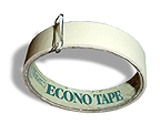A roll of masking tape with a paper clip marking the end of the tape.